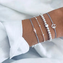 Nuwe Boheemse Swart Tou Armband Stel vir Dames Vliegtuig Skulp Maan Hart Kristal Bedelarmband Boho Juweliersware