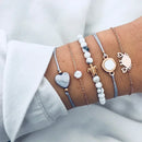 Nuwe Boheemse Swart Tou Armband Stel vir Dames Vliegtuig Skulp Maan Hart Kristal Bedelarmband Boho Juweliersware