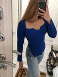 Suéter feminino sem gola e manga comprida com decote em V e parte de baixo